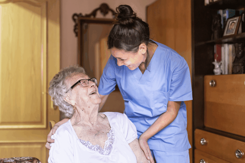 A nurse talking with a dementia care patient