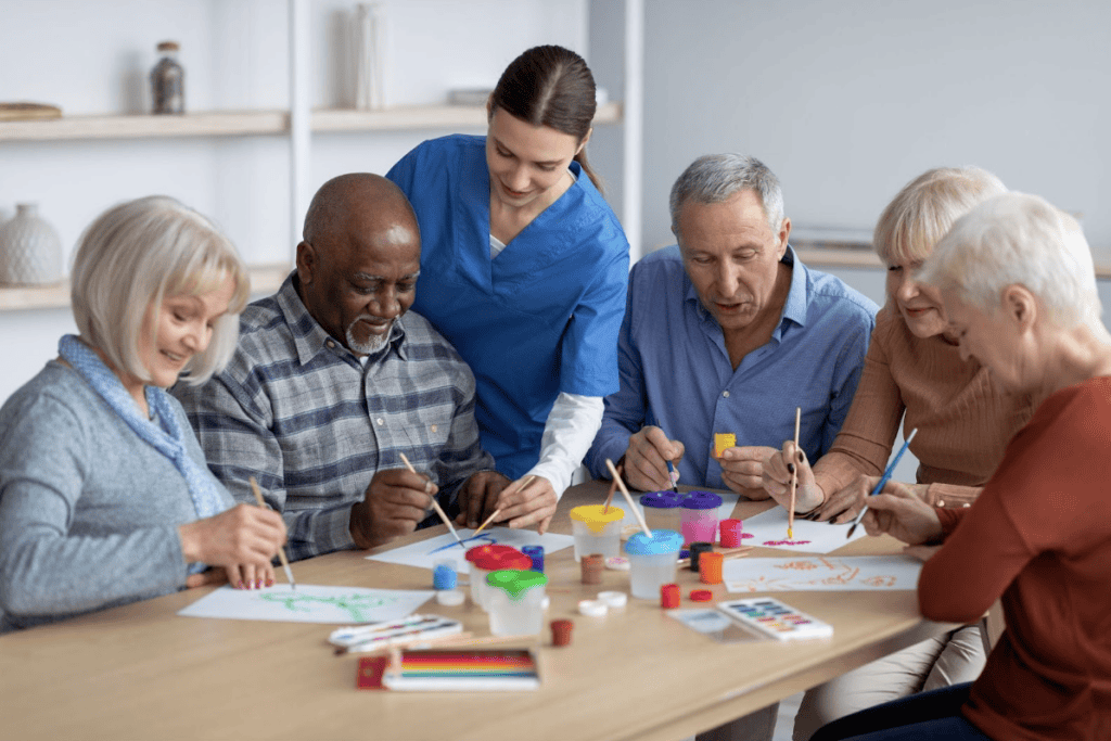 Seniors enjoying arts and crafts together at a healthcare center