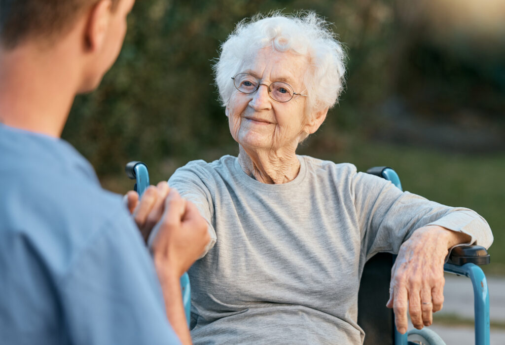 woman receiving therapy at a skilled nursing facility.