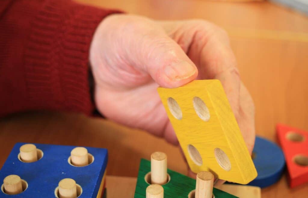 Occupational therapy exercise for fine motor skills activities.
